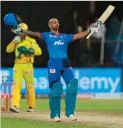  ??  ?? Shikhar Dhawan of Delhi Capitals celebrates after guiding his team to win against Chennai Super Kings in Sharjah, UAE, on Saturday