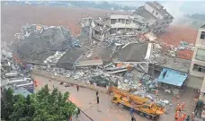  ?? AFP/GETTY IMAGES ?? A landslide destroyed about 20 buildings in the south Chinese city of Shenzhen on Sunday, leaving 27 people missing, the Ministry of Public Security’s firefighti­ng bureau said.