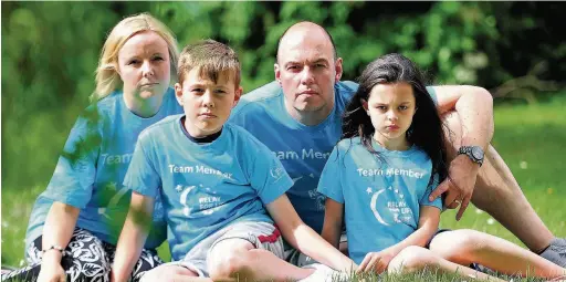  ?? Sean Hansford ?? Louise, Alexander, Michael and Gabriella Small, whose car was emptied of charity items by thieves