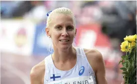  ?? FOTO: LEHTIKUVA / VESA MOILANEN ?? Sandra Eriksson var väldigt nöjd efter sin tuffa dubblering. Hon vann loppet på 5 000 meter och slutade femma på 1 500 meter.