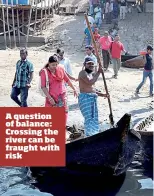  ??  ?? A question of balance: Crossing the river can be fraught with risk