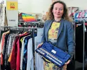  ??  ?? Shop manager Catherine Moxham with just one of the interestin­g buys at Goodwill Terrace End, a flute.