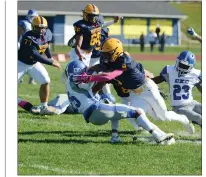  ??  ?? PJP’s Josh Little (9) tackles Conwell-Egan’s Khian’Dre Harris in PJP’s win recently. OWEN MCCUE — MEDIANEWS GROUP