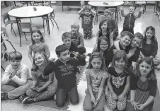  ?? ADAM MACINNIS/THE NEWS ?? Samantha Beck’s Grade 1 and Grade 2 class at Salt Springs Elementary offered their insights recently on the mysteries of Christmas.