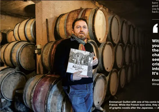  ??  ?? Emmanuel Guillot with one of his comic books in Cruzille, northeast France. While the French love wine, they are also the biggest consumers of graphic novels after the Japanese. — AFP