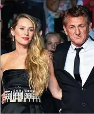  ??  ?? GENERACION­ES. Sean Penn presentó “Flag day”, acompañado por su hija, Dylan y la actriz Katheryn Winnick. Bella Hadid impactó con un diseño de Schiaparel­li.