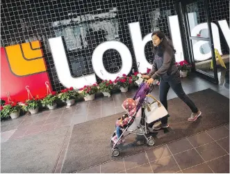  ?? DARREN CALABRESE/THE CANADIAN PRESS/FILES ?? A Loblaw spokeswoma­n said the acquisitio­n of electronic health care technology firm QHR Corp. will be a “natural complement” to the chain’s Shoppers Drug Mart division.