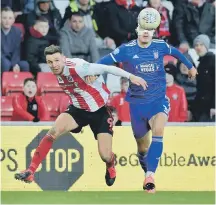  ??  ?? Charlie Wyke sliced an effort into the Ipswich keeper’s arms.