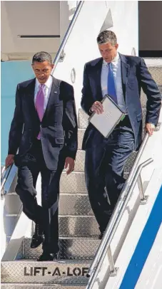  ?? | ADAMBIRD/ AP ?? In 2010, Education Secretary Arne Duncan exits Air Force One with President Barack Obama.