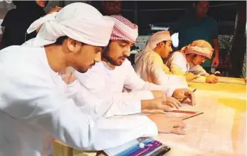  ?? Abdul Rahman/Gulf News ?? Students visit the Abu Dhabi Urban Council pavilion on the opening day of the 5th Education Interface Exhibition at Du Forum, Yas Island, yesterday.