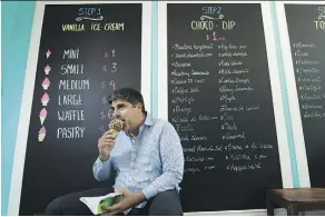  ?? NATHAN DENETTE/THE CANADIAN PRESS ?? La Diperie co-owner Sam Arif says he hopes his company’s spirit of innovation and community involvemen­t will carry his soft-serve ice-cream business through the winters.