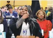  ?? MICHAEL REYNOLDS AP ?? Wandrea Moss testifies while her mother, Ruby Freeman, listens. Both were Georgia election workers.