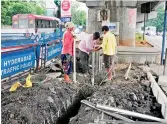  ??  ?? DC Road being given facelift at Tarnaka X roads to ease traffic and help pedestrian­s. —