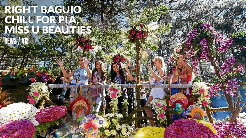  ?? —EV ESPIRITU ?? FLOAT OF FLOWERS AND MASKS Several Miss Universe candidates ride on a float adorned with flowers and masks representi­ng the Visayas during a parade on Session Road in Baguio City. The three other floats bearing the other beauties, including reigning...