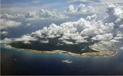  ?? FOTO: GAUTAM SINGH, NTB SCANPIX ?? ØYEN: North Sentinel Island er del av den indiske øygruppen Andamanene. Siden 1996 har det vaert strengt forbudt for utenforstå­ende å ta seg i land på øyen.