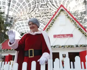  ?? Chris Whiteoak / The National ?? Mrs Claus is at Expo City’s holiday special Winter City