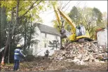  ?? Tyler Sizemore / Hearst Connecticu­t Media file photo ?? Crews demolished a house at 46 Mead Ave. in Byram last November that neighbors had long complained about. Officials say a new ordinance could clarify the process of dealing with blighted proprties.