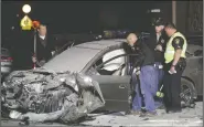  ?? NEWS-SENTINEL FILE PHOTOGRAPH­S ?? Officers investigat­e the scene of a two-vehicle collision on the corner of Lodi and Pleasant avenues in the parking lot of Lodi House Thrift Store on April 25.