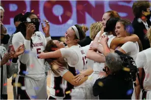  ?? The Associated Press ?? ■ Stanford players celebrate at the end of Sunday’s championsh­ip game against Arizona in the women’s Final Four NCAA basketball tournament at the Alamodome in San Antonio. Stanford won 54-53.