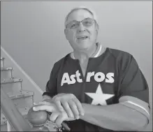  ?? Juan Lozano / The Associated Press ?? Paul Daulong says the Astros’ trip to the World Series has helped him and his family focus on something positive as they continue rebuilding their Houston home after it was flooded during Hurricane Harvey.