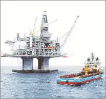  ?? FILE PHOTO OF HIBERNIA PLATFORM OR KOMETIK TANKER ?? The Hibernia Management and Developmen­t Company Ltd. was fined $250,000 in provincial court on Friday relation to an oil spill that occurred in December of 2013.