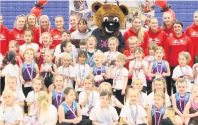  ?? Beth Tweddle MBE with her Total Gymnastics crew at Maghull High School ??