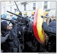  ?? ANSA/AP/MATTEO BAZZI ?? Police clash with students opposing a neo-fascist party during a rally Saturday in Milan, Italy. Similar marches were held in other Italian cities on the final weekend for political action before the March 4 national election.