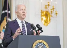  ?? Patrick Semansky The Associated Press ?? President Joe Biden delivers a speech highlighti­ng the $1.9 trillion COVID-19 relief package Monday in the State Dining Room of the White House.