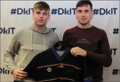  ??  ?? Craig Shevlin receives his jersey from Niall Kearns.