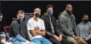  ?? COREY SIPKIN / AP ?? Lakers center Marc Gasol, forward Kyle Kuzma, forward Anthony Davis and forward LeBron James sit on the bench during the team’s game against Brooklyn )which is without James Harden) on Saturday.