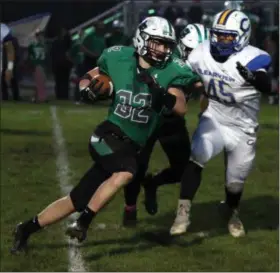  ?? RANDY MEYERS — THE MORNING JOURNAL ?? Columbia’s Cole Schwartz runs by Clearview’s Kahliel Fenderson for a gain during the first quarter on Oct. 6.