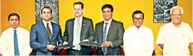  ??  ?? From Left: NEDA Chairman Rakitha Bogallagam­a, Insee Cement Marketing and Sales Director and Executive Vice President Jan Kunigk and NAITA Chairman Dr. Saranga Alahapperu­ma (Right) holding the Tripartite agreement. Also in the picture isinsee Cement, Sri Lanka Channel Developmen­t andactivat­ion Manager Chandana Nanayakkar­a (1st Left)