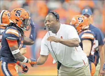  ?? [PHOTOS BY NICK LISI/THE ASSOCIATED PRESS] ?? “I don’t think there’s a game in the ACC we’ve been out of, and I’m proud of that part,” Syracuse head coach Babers said. “I don’t think the guys have quit.”