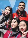  ?? MIKE LAWRIE/ GETTY IMAGES ?? Pita Taufatofua of Tonga poses with volunteers.