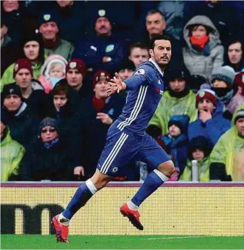  ?? Reuters ?? Chelsea’s Pedro celebrates scoring the first goal against Burnley during the Premier League match yesterday.
