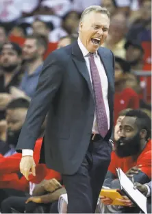  ?? Karen Warren / Houston Chronicle ?? Houston head coach Mike D’Antoni is upset with a referee’s call in Game 3. He can’t explain the series of one-sided games.