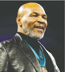  ?? STEVE MARCUS/ REUTERS FILES ?? Former heavyweigh­t champion Mike Tyson, who hasn't fought in a profession­al boxing match in 15 years, will face Roy Jones Jr. on Saturday at the age of 54 in an exhibition match.