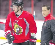  ??  ?? Bobby Ryan skates past coach Guy Boucher as the Ottawa Senators prepare to face the Pittsburgh Penguins. WAYNE CUDDINGTON / POSTMEDIA.