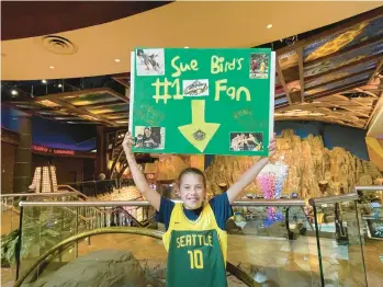  ?? LILA BROMBERG/HARTFORD COURANT ?? Maggie Artus, 10, of Groveland, Mass., traveled to Mohegan Sun Arena to see Sue Bird and the Seattle Storm play the Sun. Artus also plays point guard and idolizes Bird, often watching her highlights on Youtube.