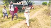  ?? –ANI ?? KSirisha, a sub-inspector in Andhra Pradesh’s Kasibugga, won wide praise for her humanity when she took on the responsibi­lity of carrying the body of an unknown homeless person, who was discovered dead in a field, to a funeral home and helping perform the last rites.