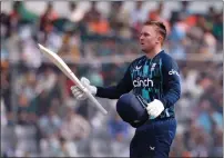  ?? — reuters ?? England’s Jason Roy celebrates after scoring a century.