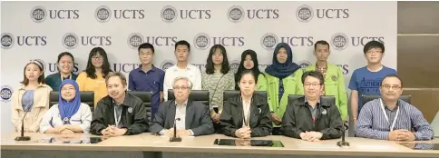  ??  ?? Dr Khairuddin (seated third left), teaching staffers of UCTS and students from overseas.