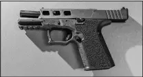  ?? KELSEY MCCLELLAN / THE NEW YORK TIMES ?? This Glock-style ghost gun is now in the posession of the San Francisco district attorney’s office. Ghost guns — untraceabl­e firearms without serial numbers, assembled from components bought online — are increasing­ly becoming the lethal weapon of easy access for those legally barred from buying or owning guns around the country.