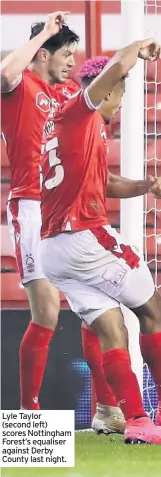  ??  ?? Lyle Taylor (second left) scores Nottingham Forest’s equaliser against Derby County last night.