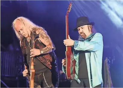  ?? PHOTOS BY RICK DIAMOND ?? Rickey Medlocke, left, Gary Rossington and Lynyrd Skynyrd kicked off a farewell tour last year.