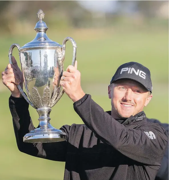  ?? — THE ASSOCIATED PRESS FILES ?? PGA Tour rookie Mackenzie Hughes of Dundas, Ont., won The RSM Classic Monday in a playoff in Sea Island, Ga.