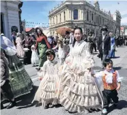  ?? PHOTOS: STEPHEN JAQUIERY ?? Sparkly . . . Mother Vivian Huang and children Charlotte (6) and Harrison Jin (4), of Christchur­ch, take part in the Grand Parade for the first time.