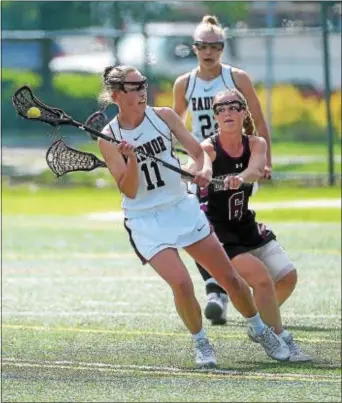  ?? PETE BANNAN — DIGITAL FIRST MEDIA ?? Radnor’s Nicole Massimino (forground, No. 11), here being hounded by fellow All-Delco player Madi O’Brien of Garnet Valley, was equally capable in an offensive or defensive role for the Raiders.