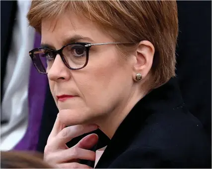  ??  ?? Under pressure: Nicola Sturgeon facing one of the low points of her career yesterday at Holyrood