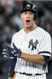  ??  ?? Yankees rookie Aaron Judge ties the score with a two-run double in the eighth. He earlier hit a solo home run.